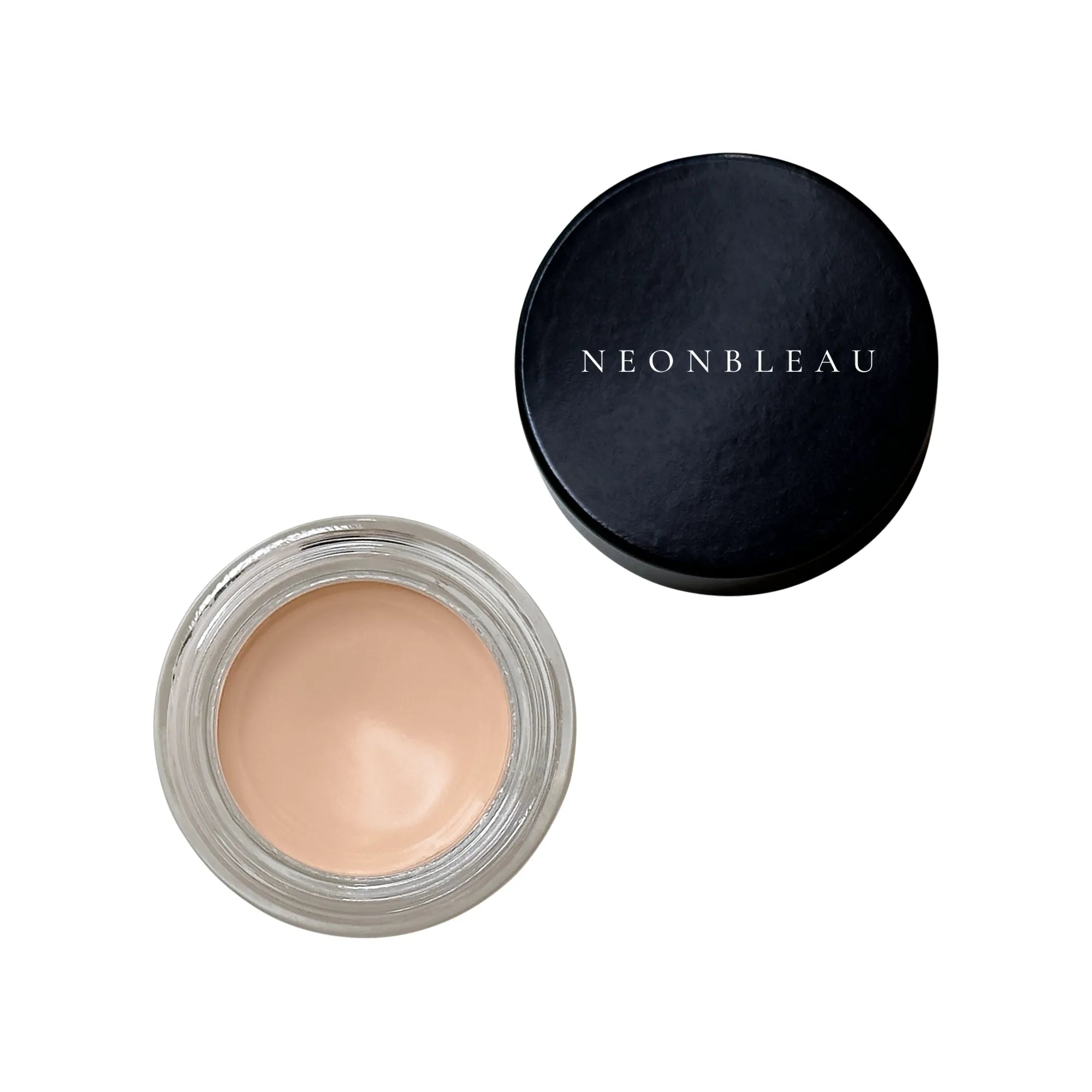 An open jar of Pearl Eye Primer next to its black lid with "NEONBLEAU" printed on it.