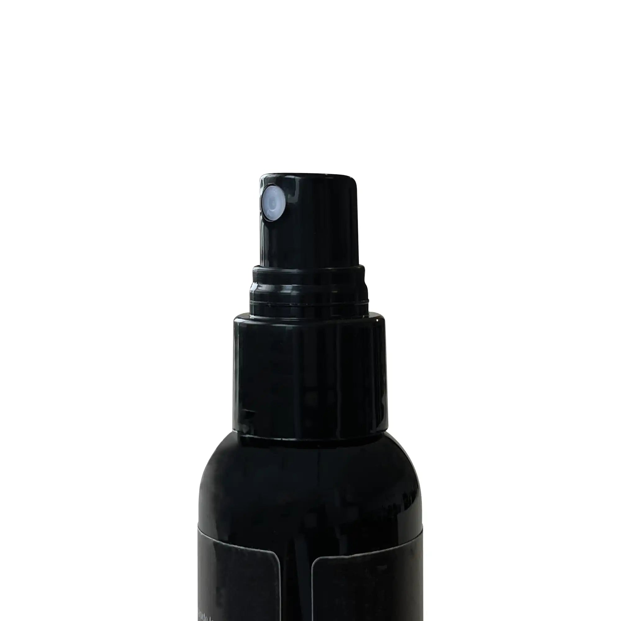 A black spray bottle with a white nozzle against a white background.