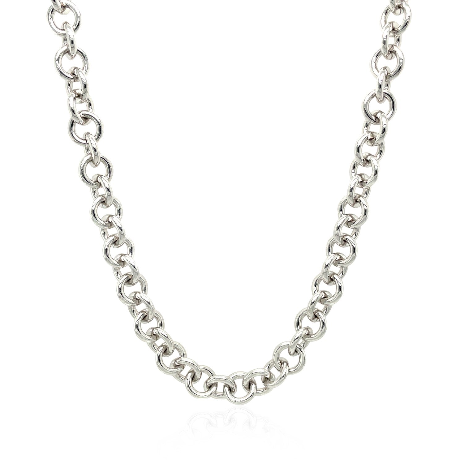Sterling silver rhodium-plated rolo chain necklace with a heart toggle charm.