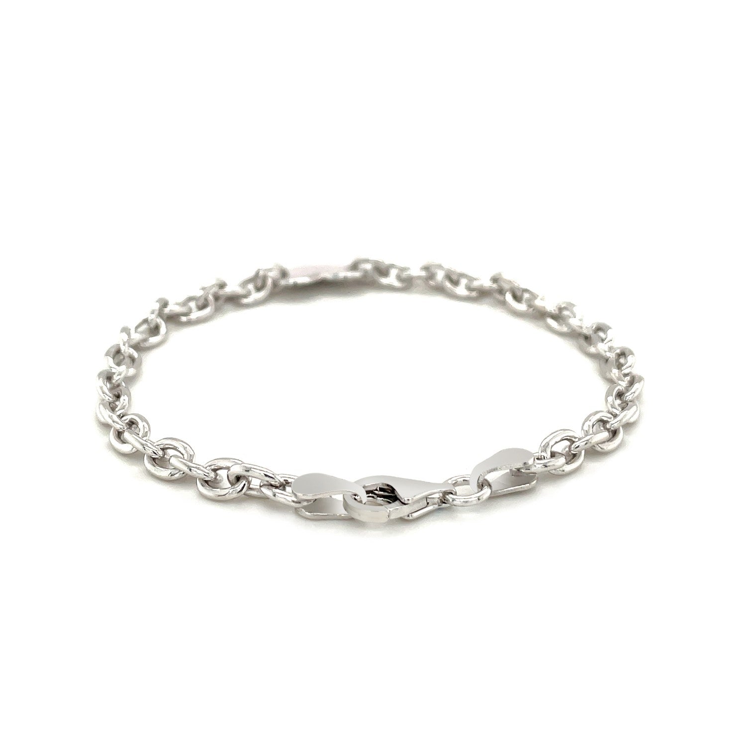 Sterling silver rhodium-plated cable chain bracelet with a flat heart station.