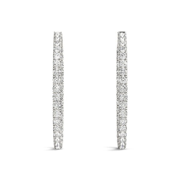 Two oval-shaped, two-sided diamond hoop earrings in 14k white gold.
