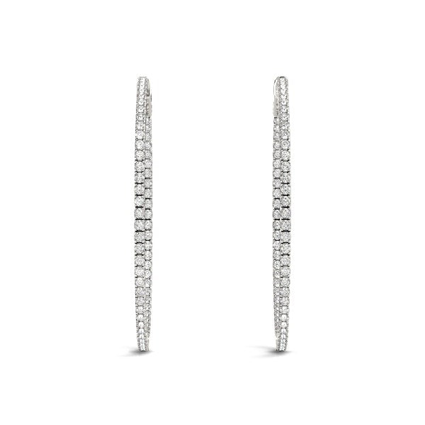 14k white gold slim two-sided diamond hoop earrings with prong settings.