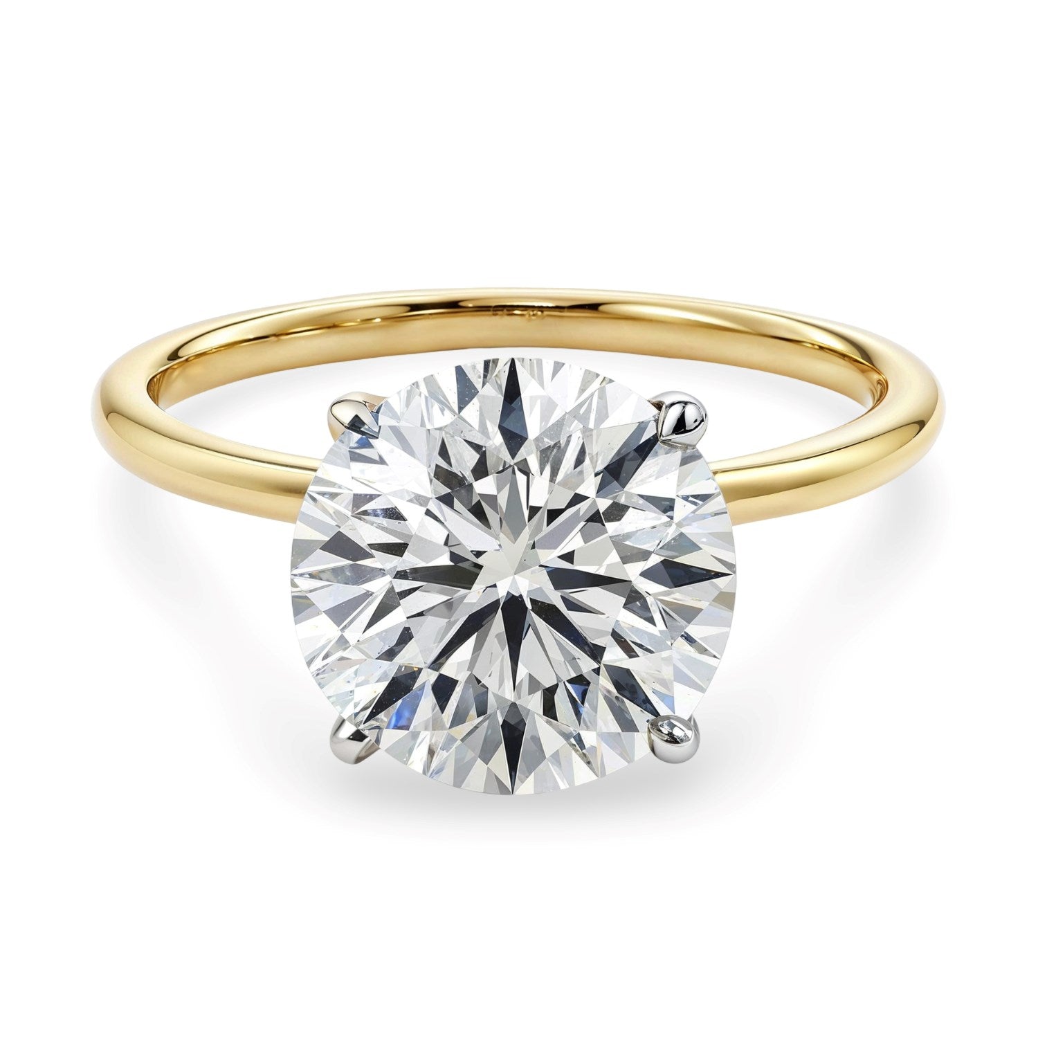 A 5 carat round lab grown diamond solitaire ring in 10K yellow gold.