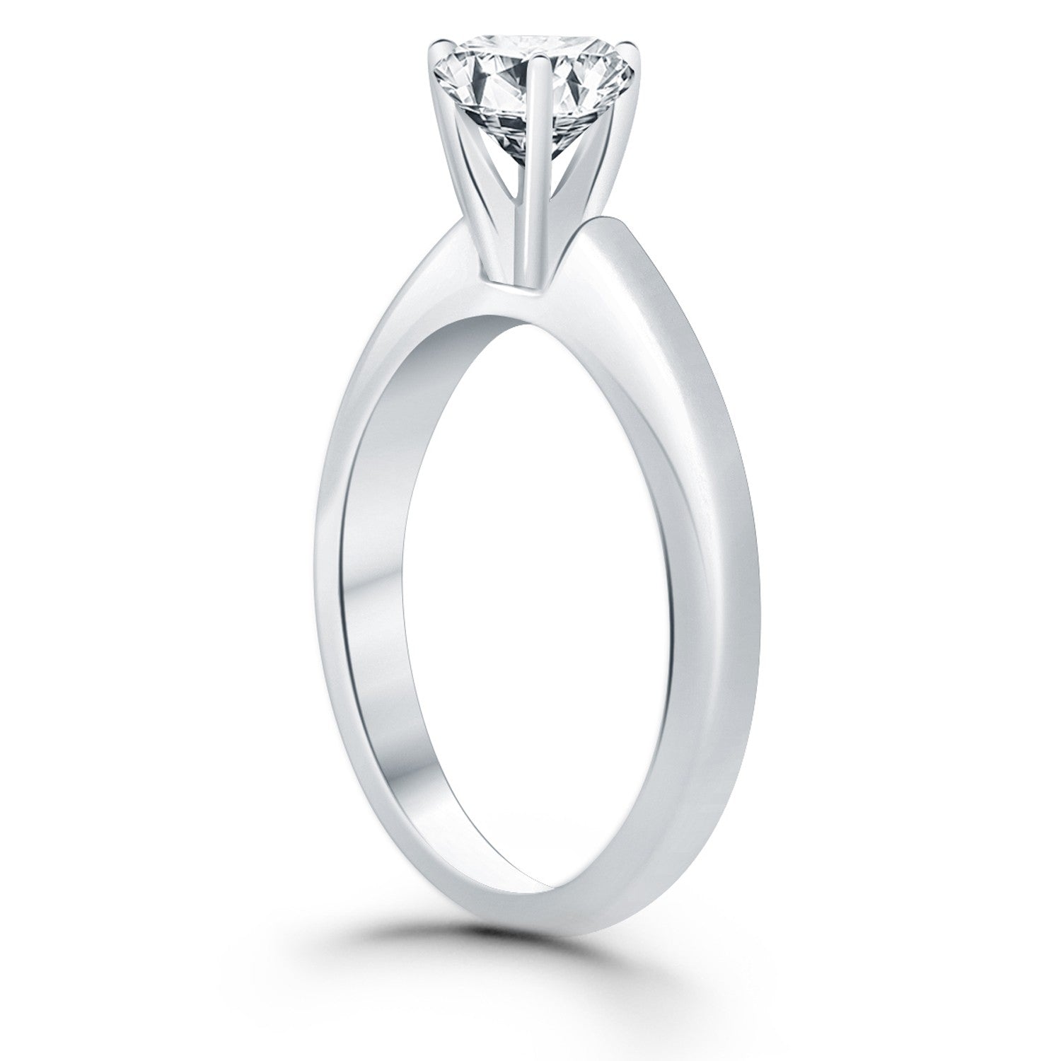 14k white gold solitaire cathedral engagement ring with a round diamond.