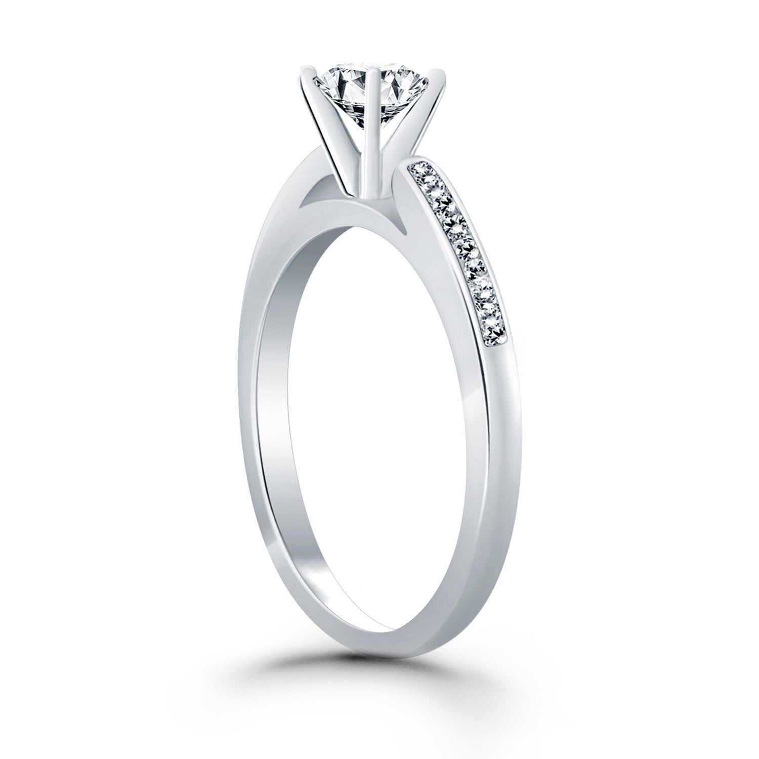 14k white gold engagement ring with a round diamond and channel-set side diamonds.