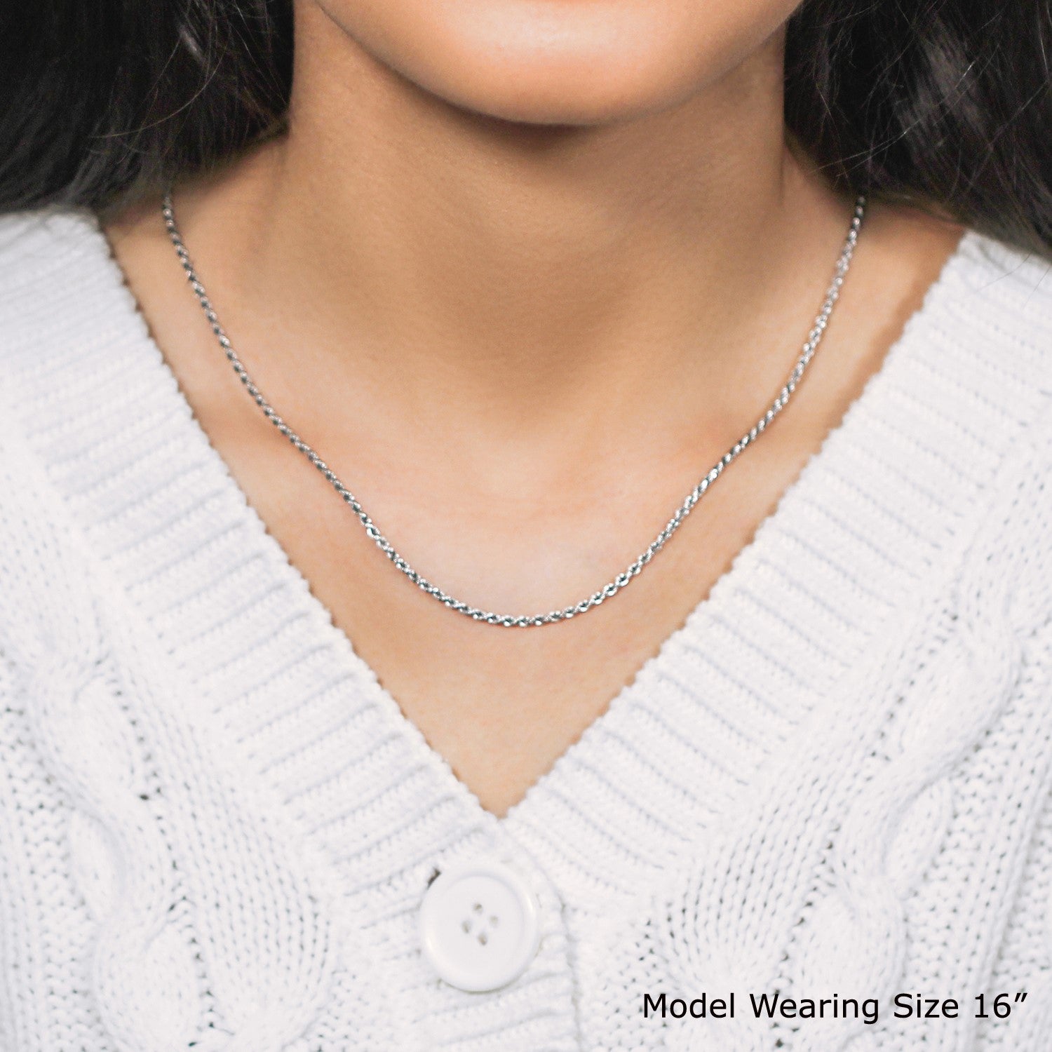 A model wears a sterling silver 1.8mm diamond cut rope chain.