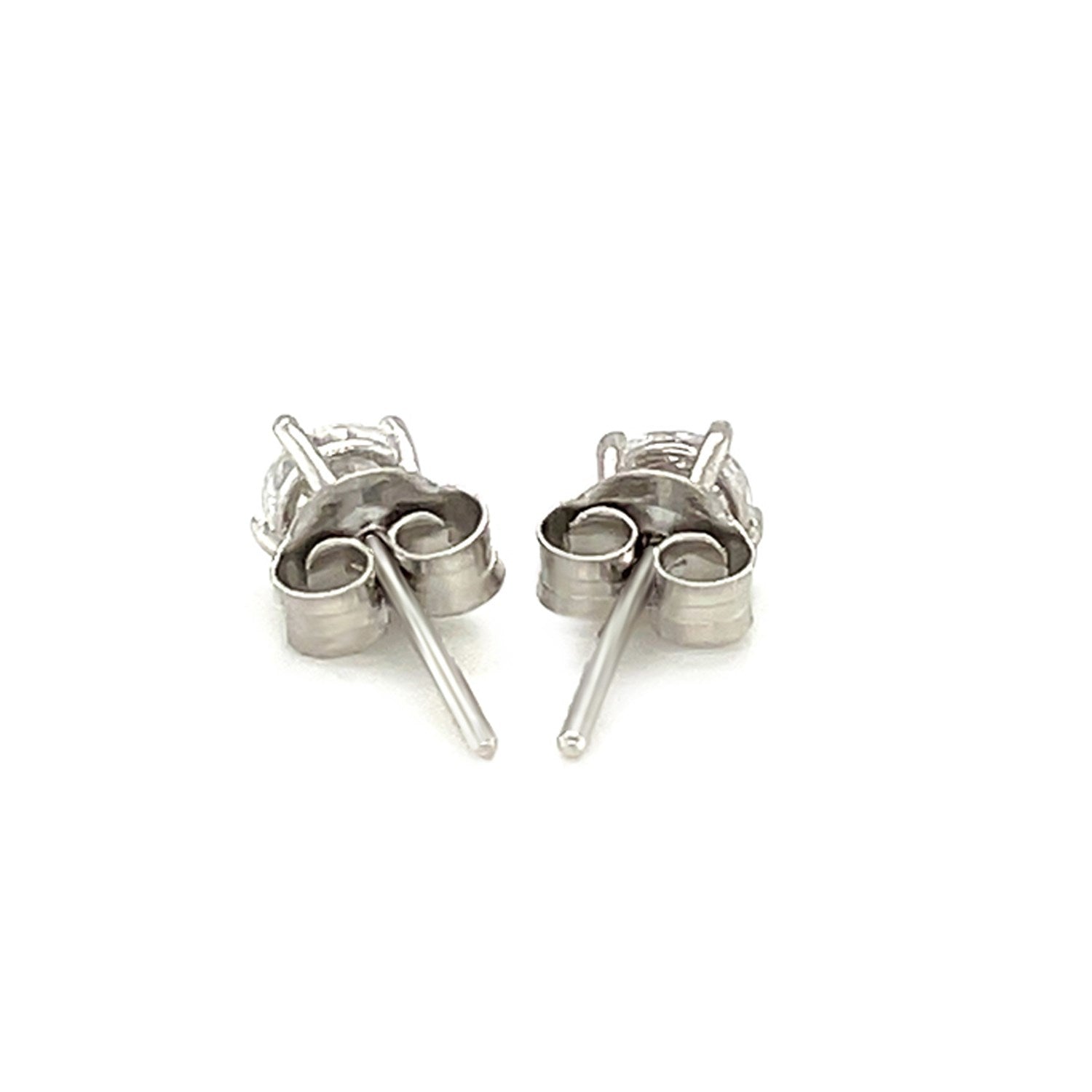 Sterling silver stud earrings with faceted white cubic zirconia, viewed from the back.