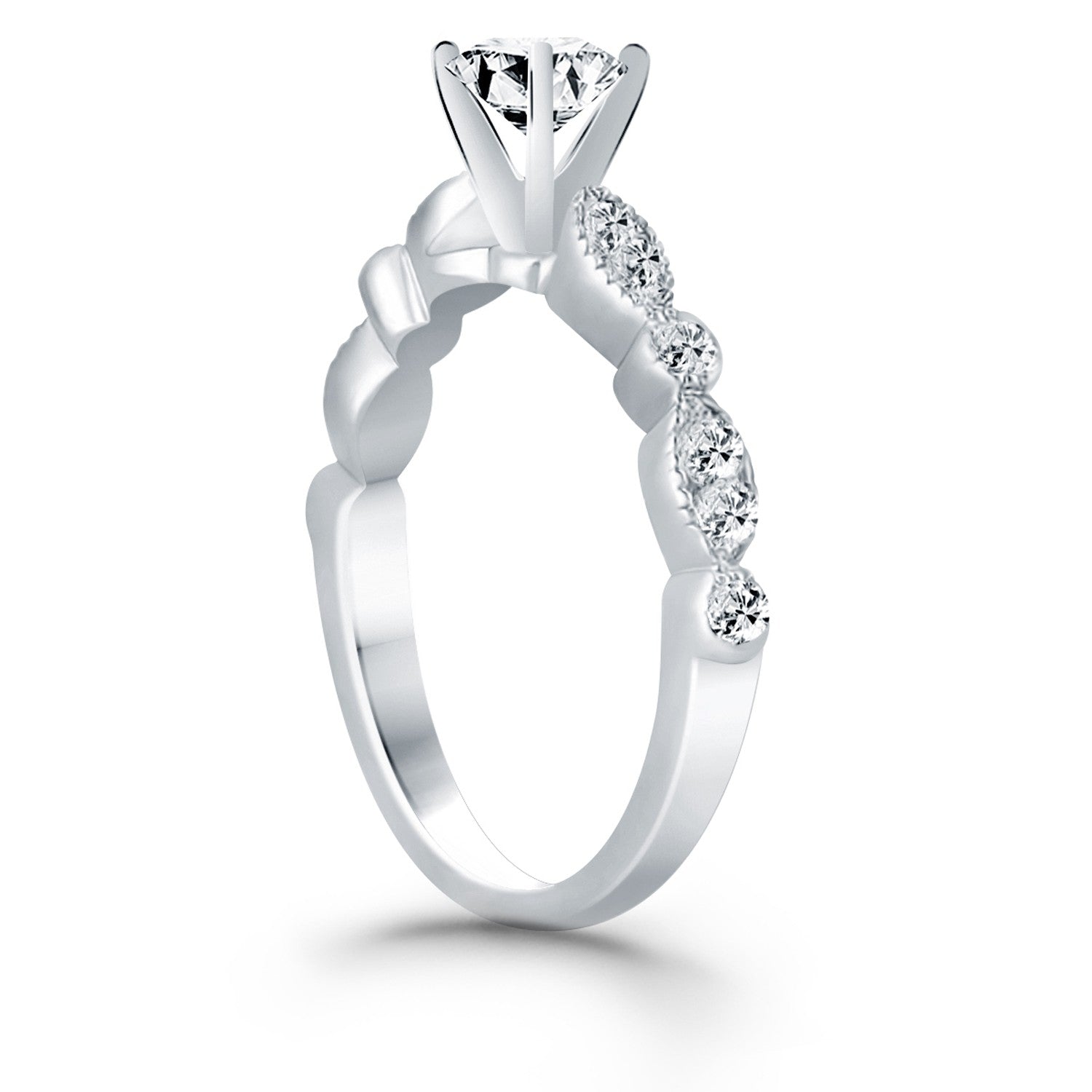 A 14k white gold engagement ring with a round diamond and fancy shaped side diamonds.
