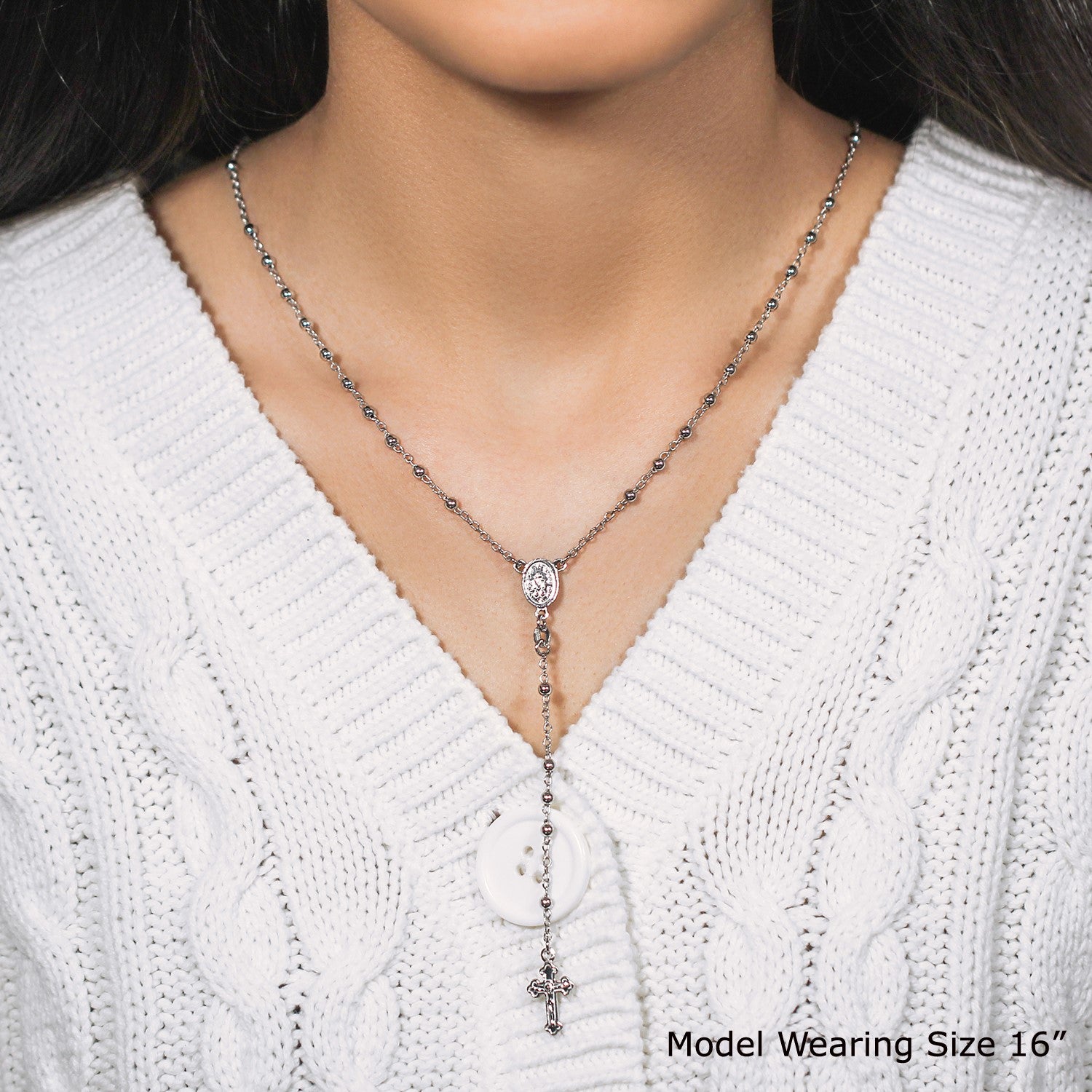 Fine sterling silver rosary chain and bead necklace with a crucifix pendant.