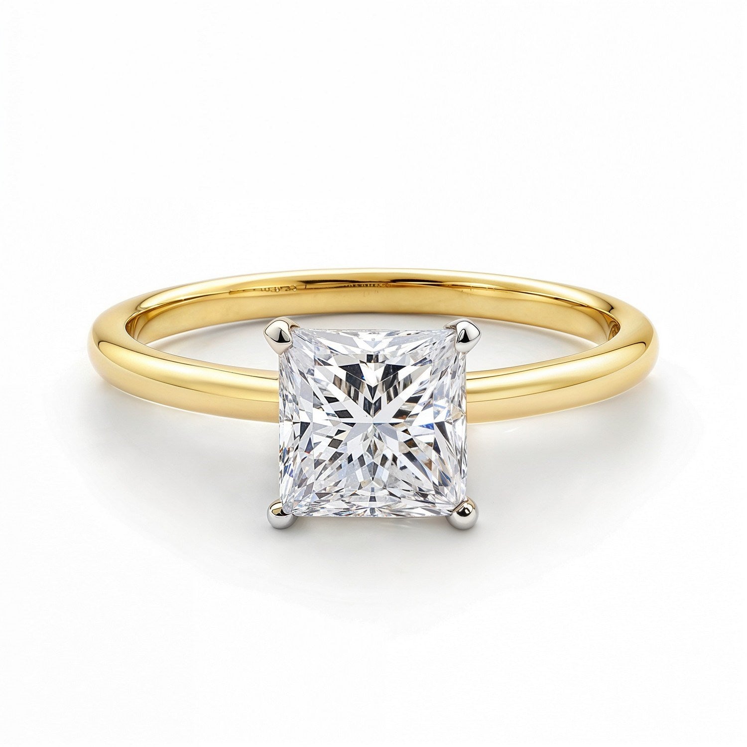 A princess-cut lab-grown diamond ring in 14K yellow gold with a white gold head.