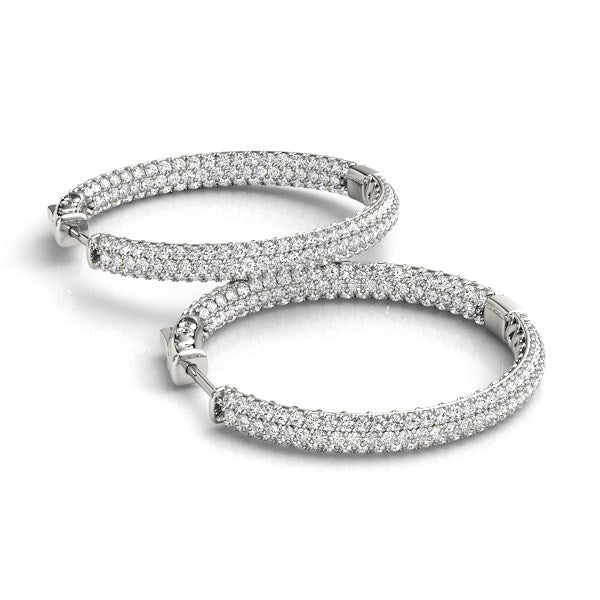 Two 14k white gold hoop earrings with two rows of pave-set diamonds.