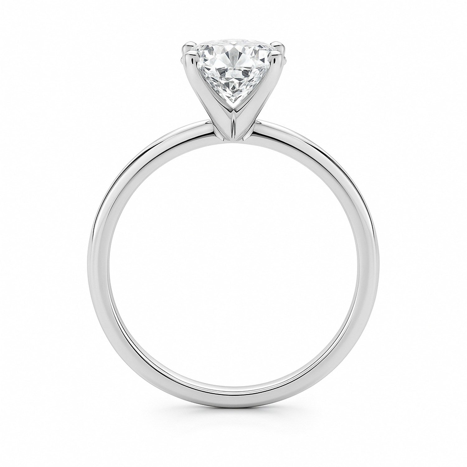 A 14K white gold solitaire ring with a cushion-cut lab-grown diamond in a four-prong setting.