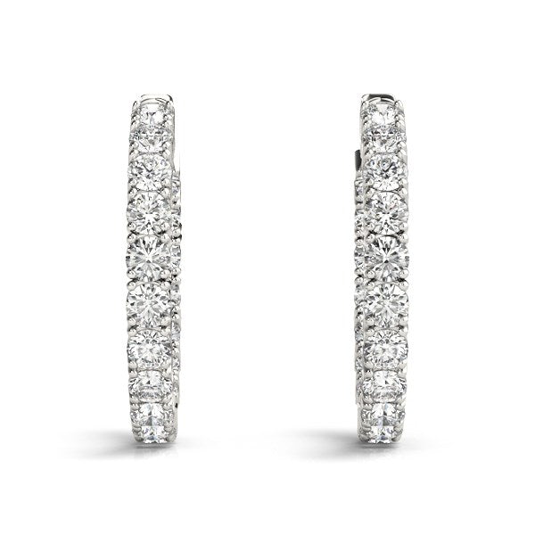14k white gold two-sided prong set diamond hoop earrings.