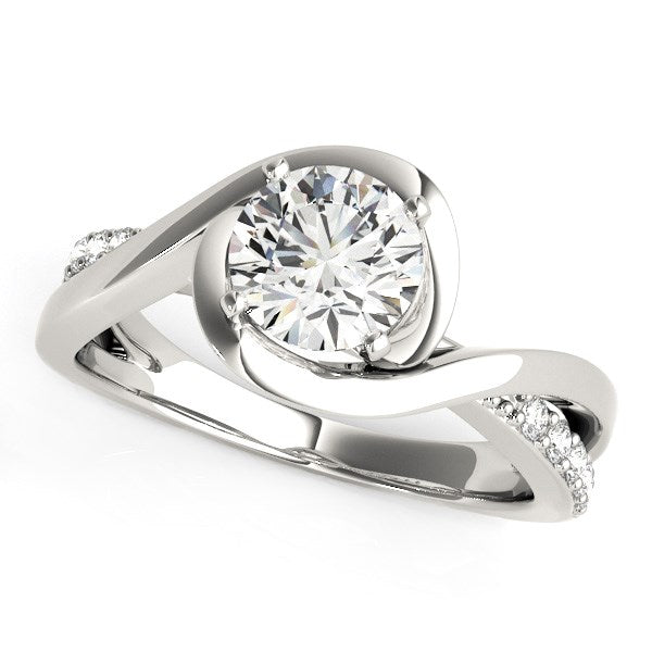 14k white gold bypass engagement ring with a round diamond and pavé accents.