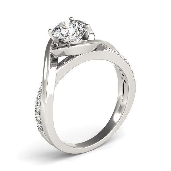 14k white gold bypass engagement ring with a round diamond and pavé accents.