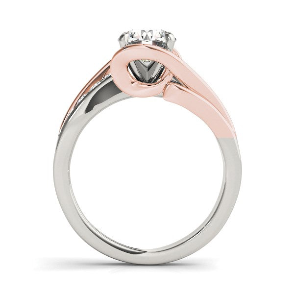 14k white and rose gold bypass diamond engagement ring with a round center stone.
