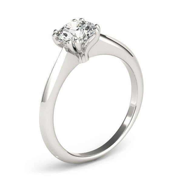 14k white gold solitaire engagement ring with a round diamond in a double prong setting.