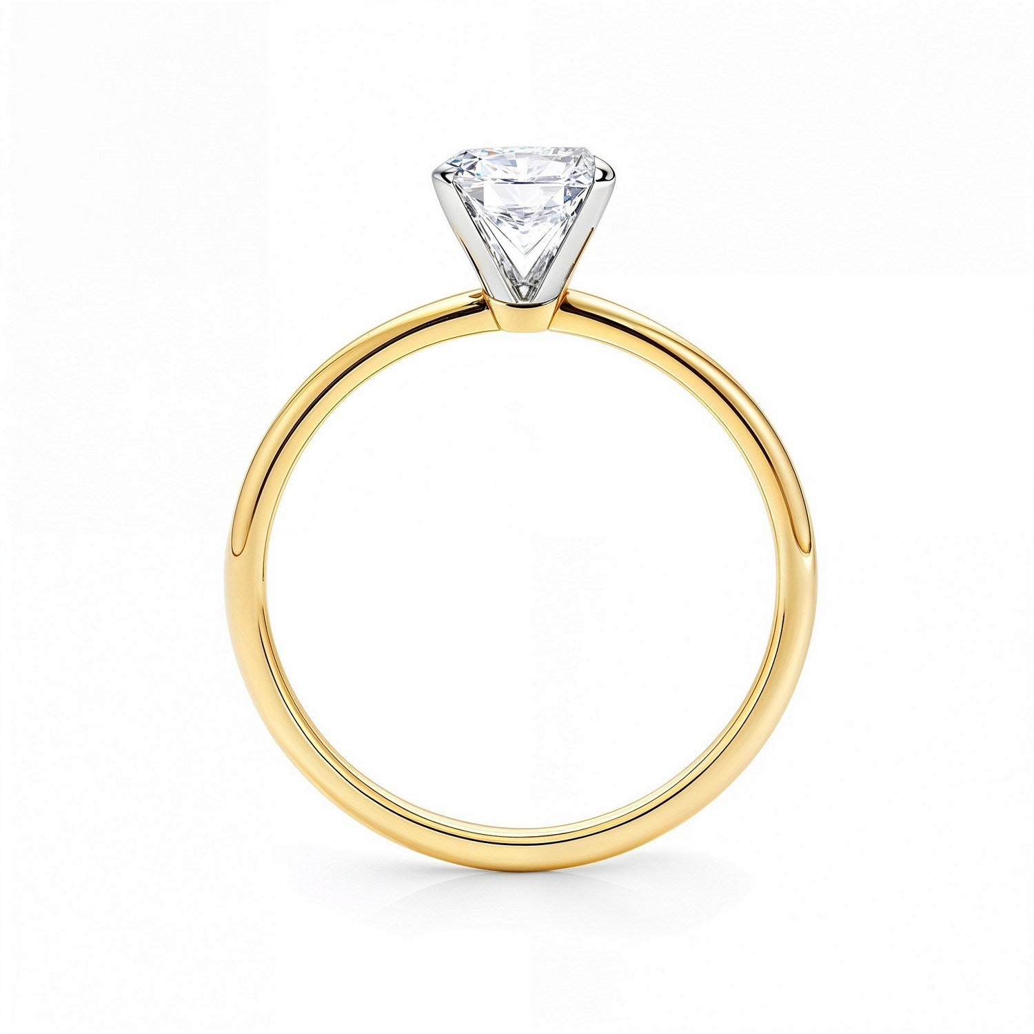Radiant lab-grown diamond ring with a yellow gold band and white gold prongs.