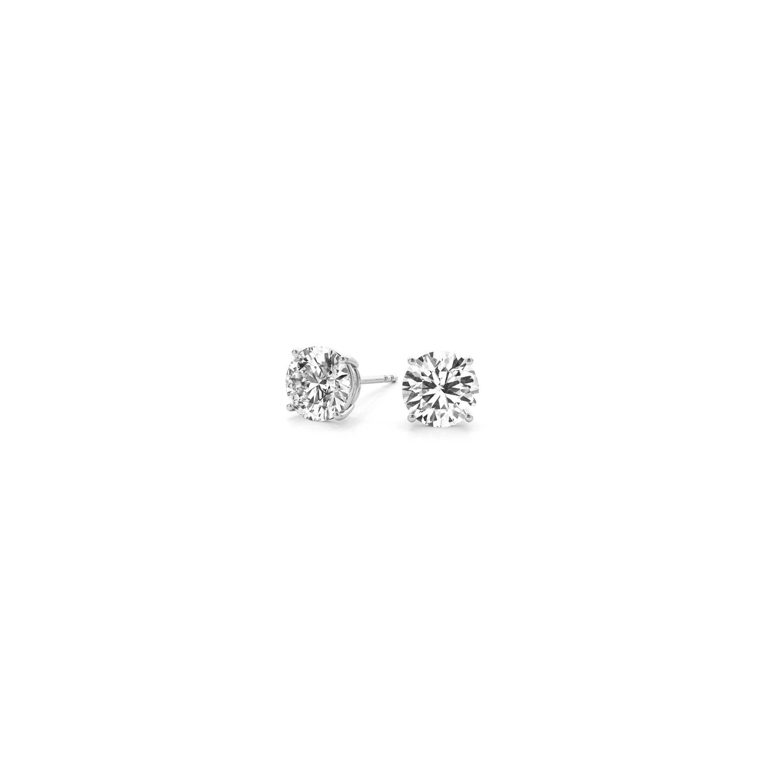 Two round lab-grown diamond stud earrings in 14k white gold with four-prong settings.
