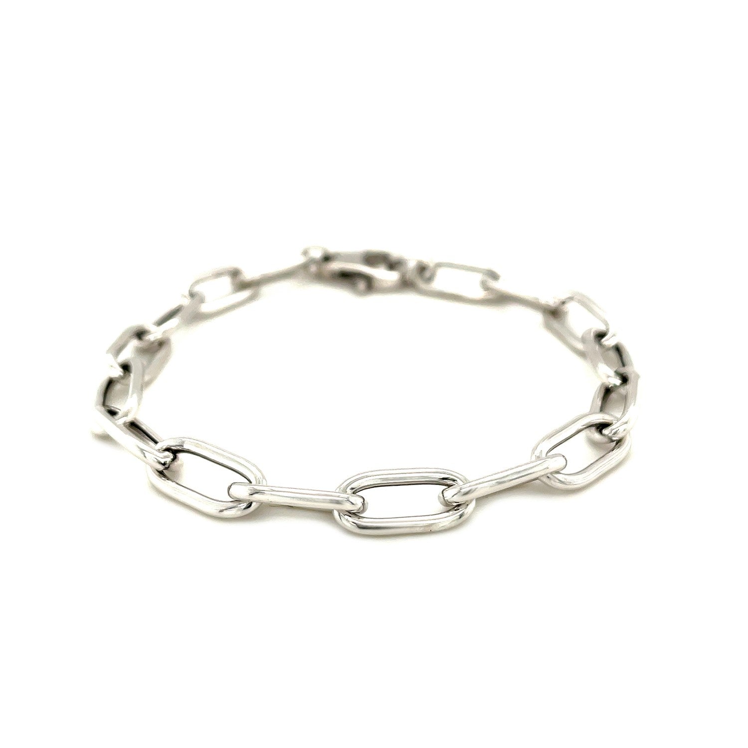 Sterling silver wide paperclip chain bracelet with a lobster clasp.