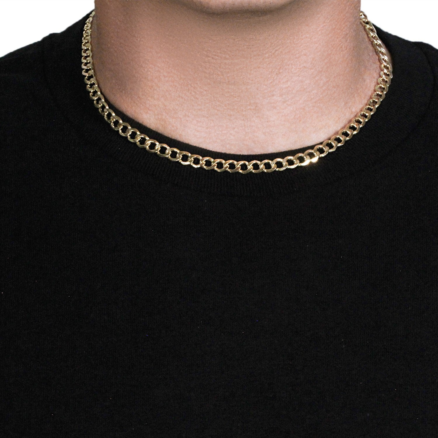 10k yellow gold curb chain, 6.20 mm wide, worn around a person's neck.
