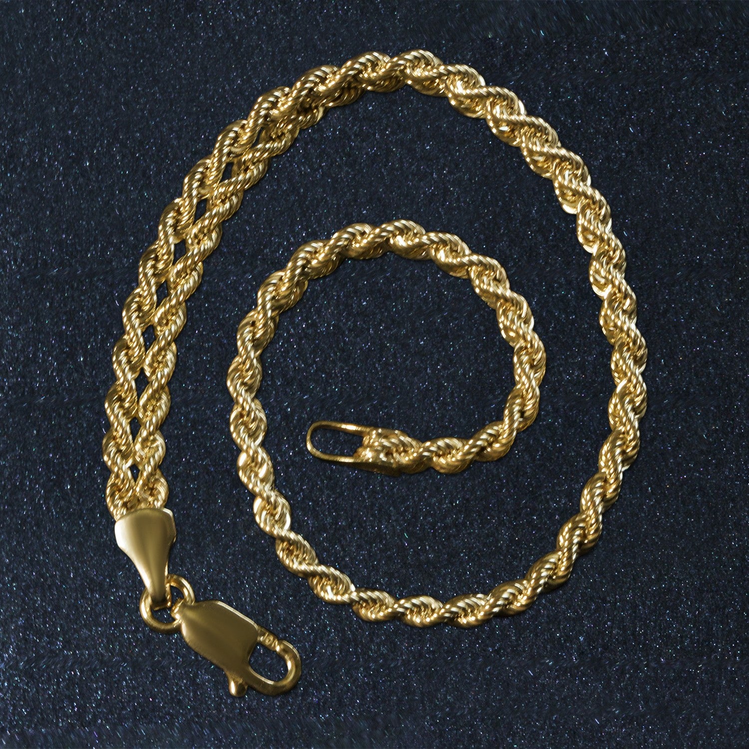 A double rope chain bracelet in 10k yellow gold with a lobster clasp.