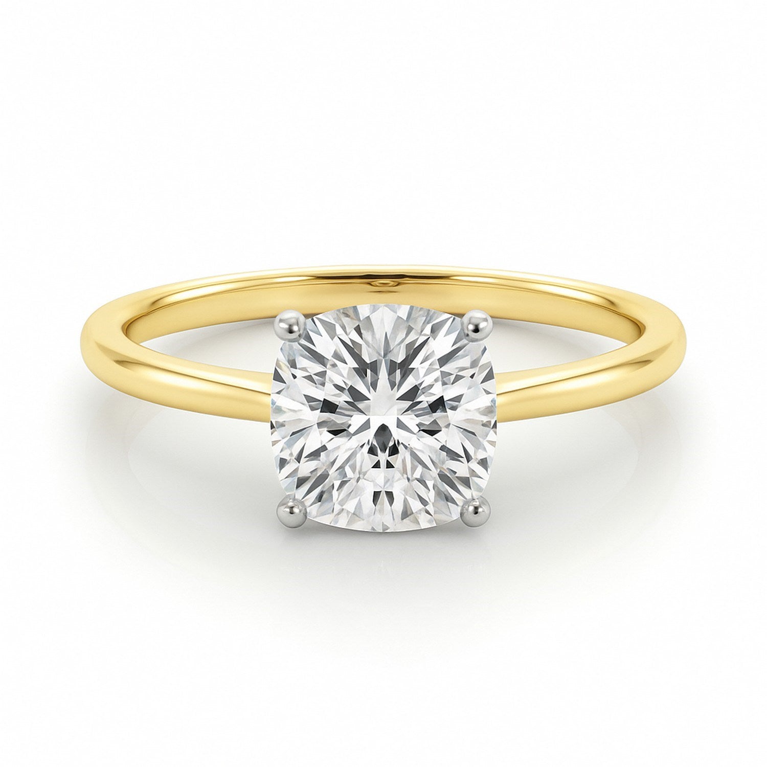 A 2 carat cushion lab grown diamond solitaire ring in 10K yellow gold.
