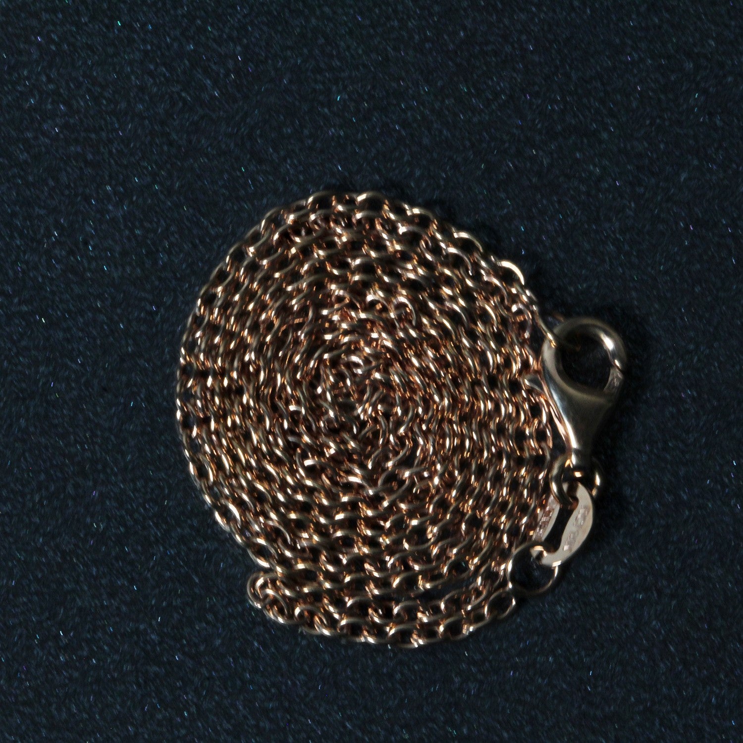14k rose gold round cable link chain with a lobster clasp.