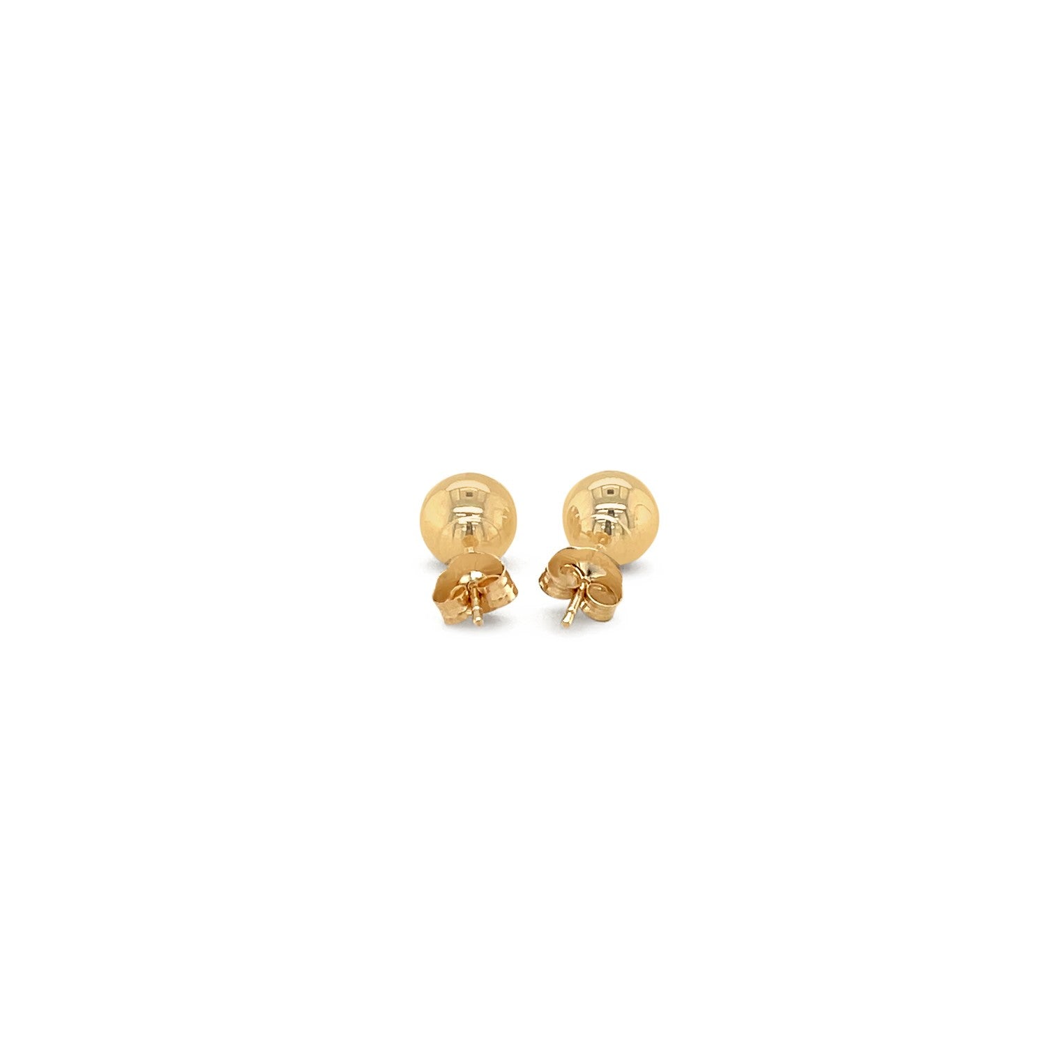 Two 10k yellow gold round stud earrings with push backs are shown.