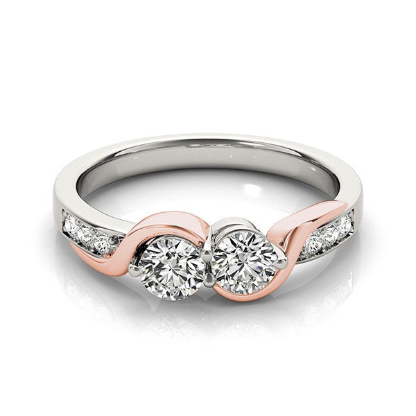 14k white and rose gold ring with two round diamonds and curved diamond band.