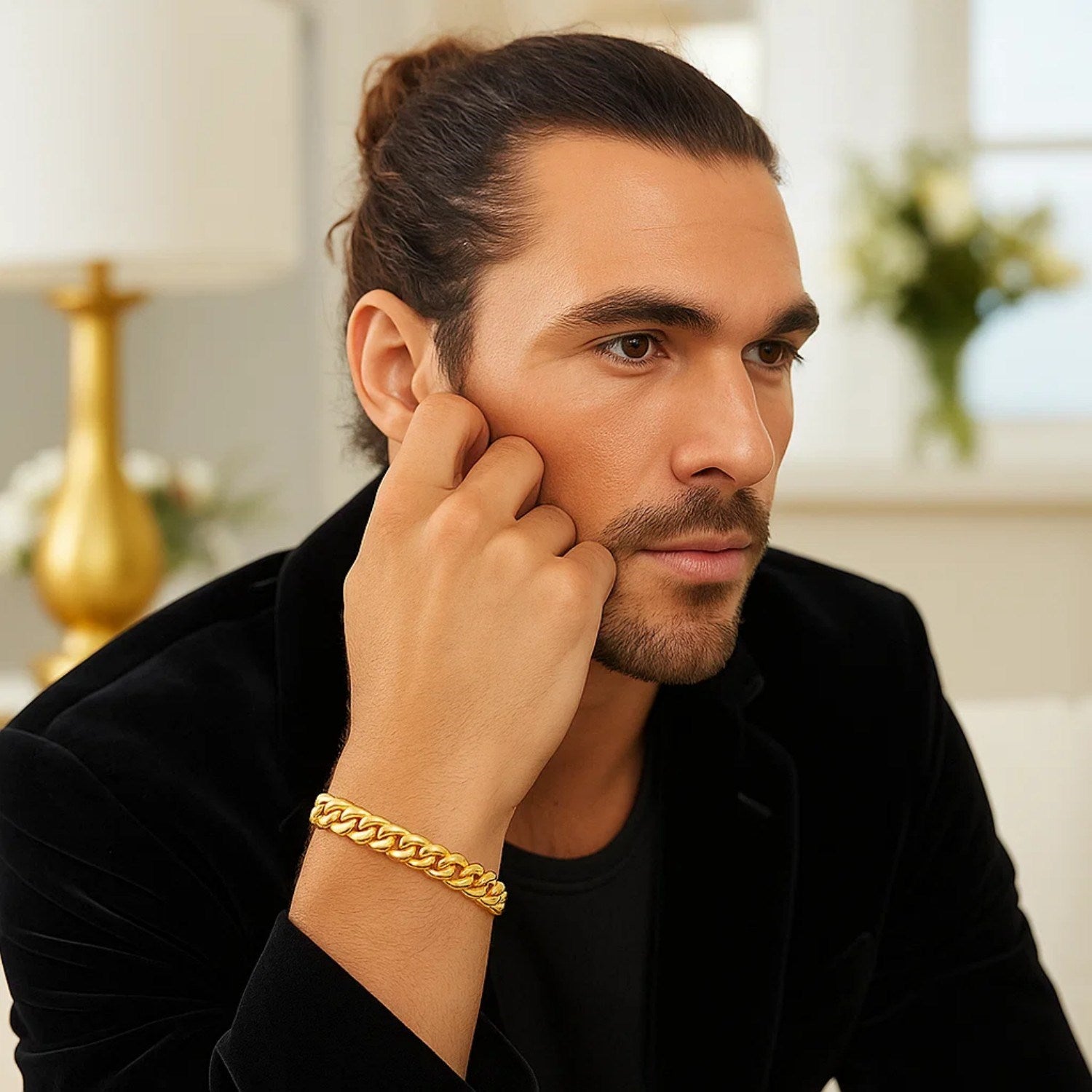 10k yellow gold semi-solid Miami Cuban bracelet on a man's wrist.