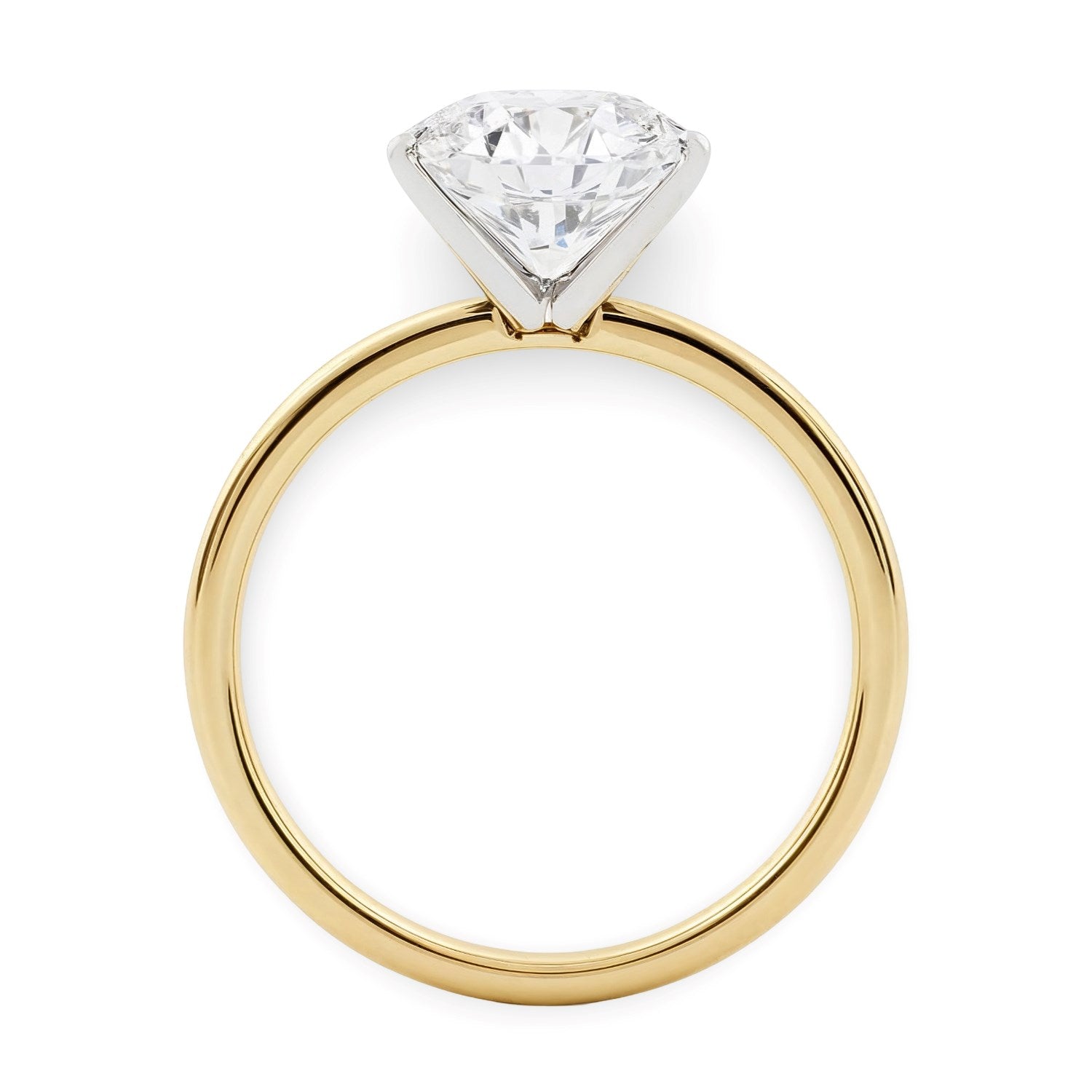 A 2 carat round lab-grown diamond solitaire ring in 14K yellow gold.