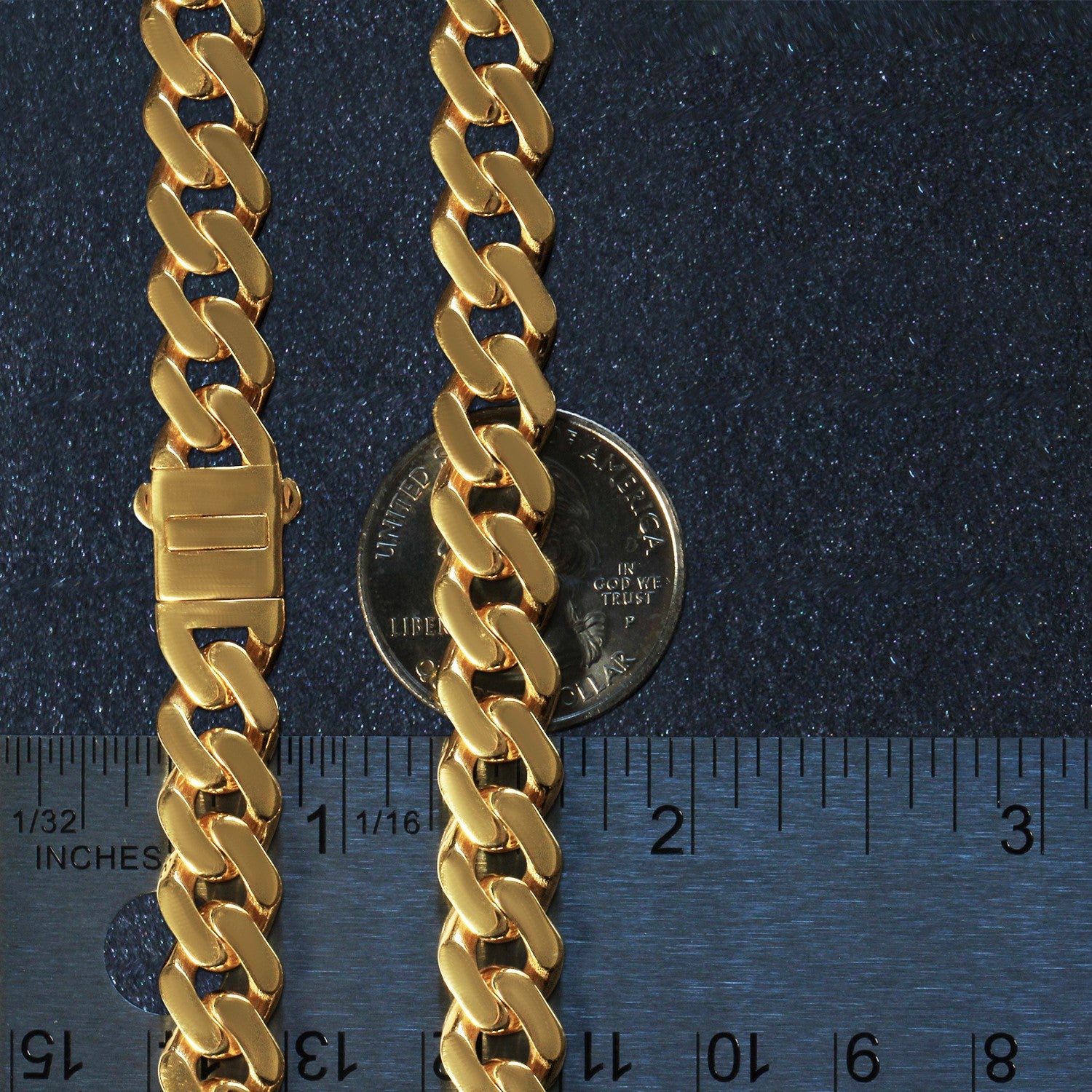 A polished 14k yellow gold curb chain necklace with a box clasp, shown with a ruler for scale.