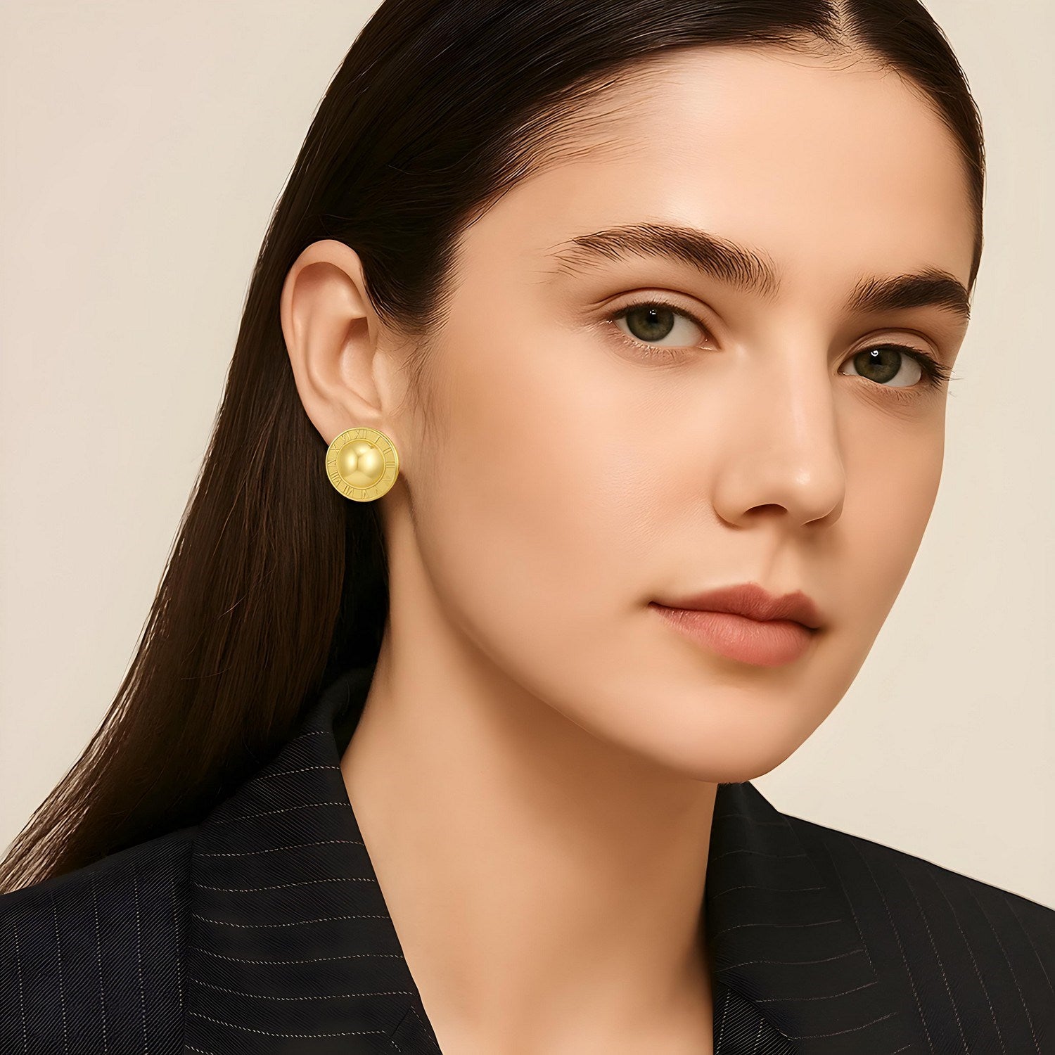 14K yellow gold Roman numeral button stud earrings on a woman.