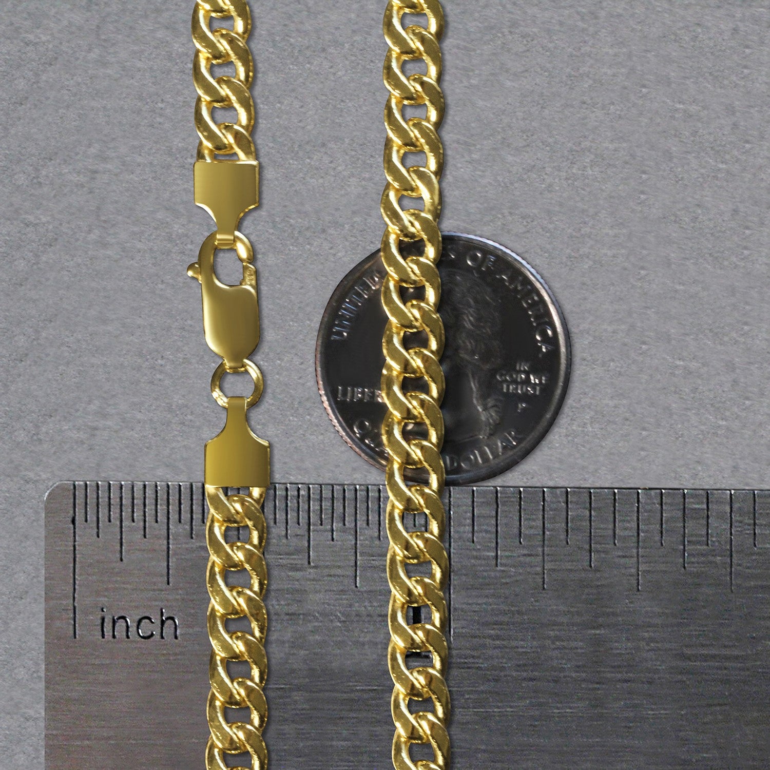 A 14k yellow gold Miami Cuban semi-solid chain with a lobster clasp, measuring 5.50 mm wide.