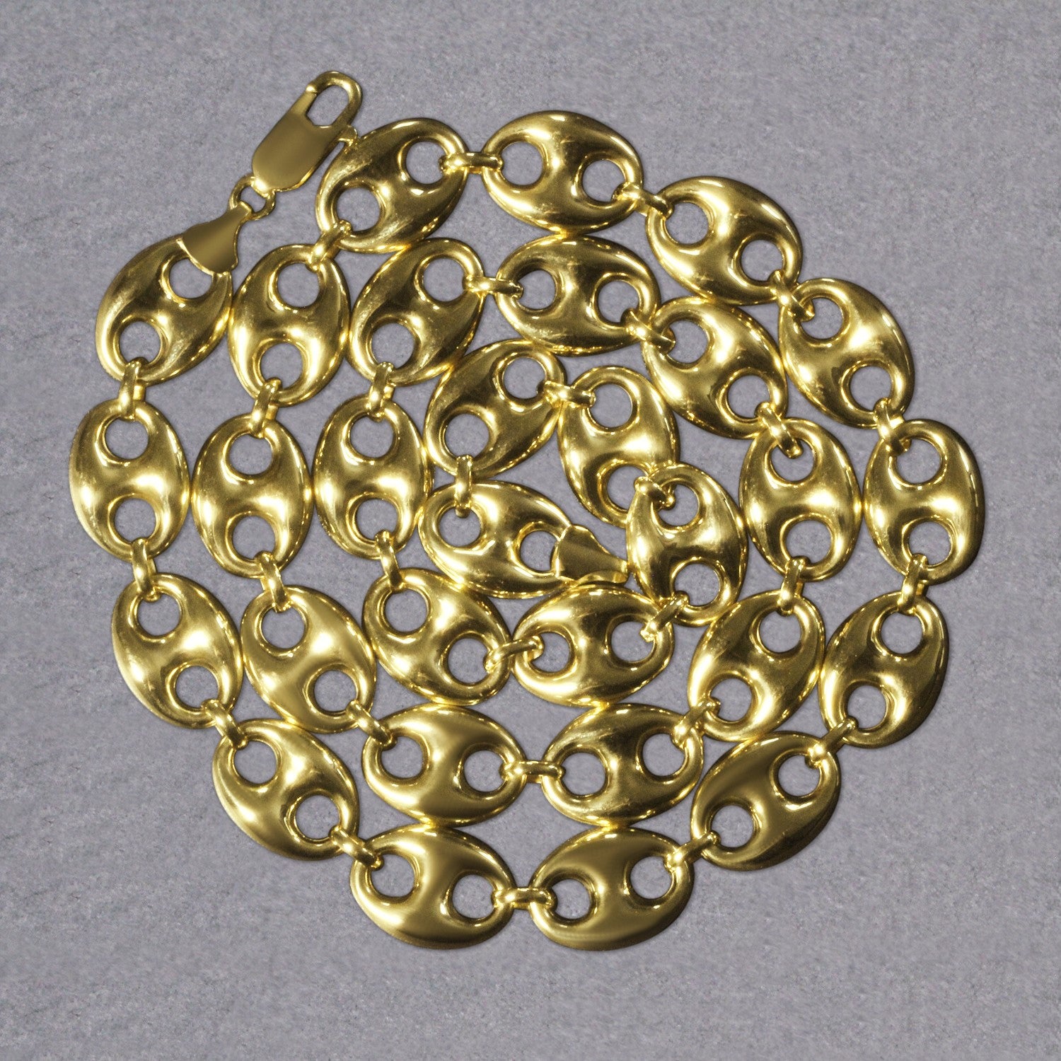 14k yellow gold puffed mariner link chain with a lobster clasp.