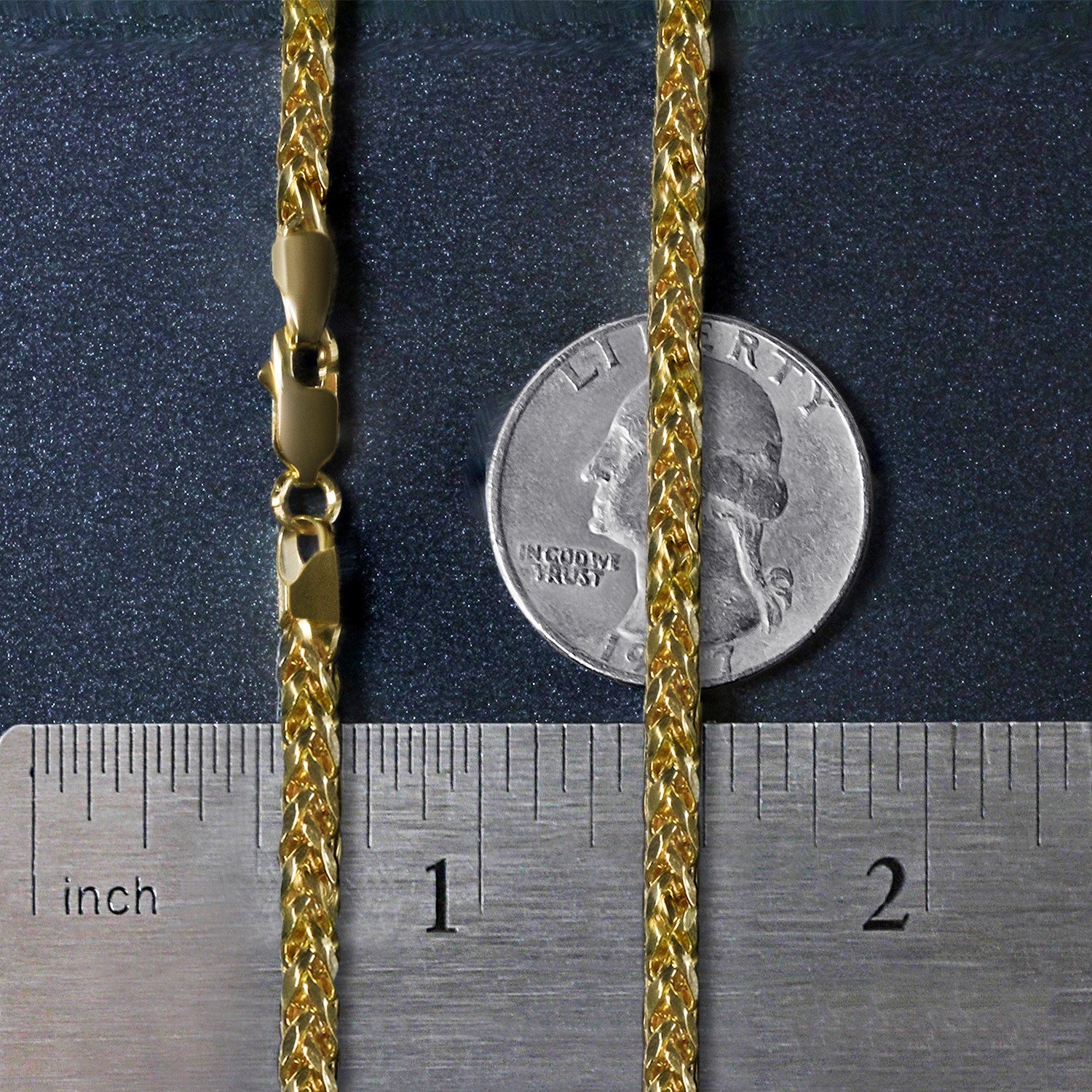 A 14k yellow gold diamond cut round franco chain with a lobster clasp.