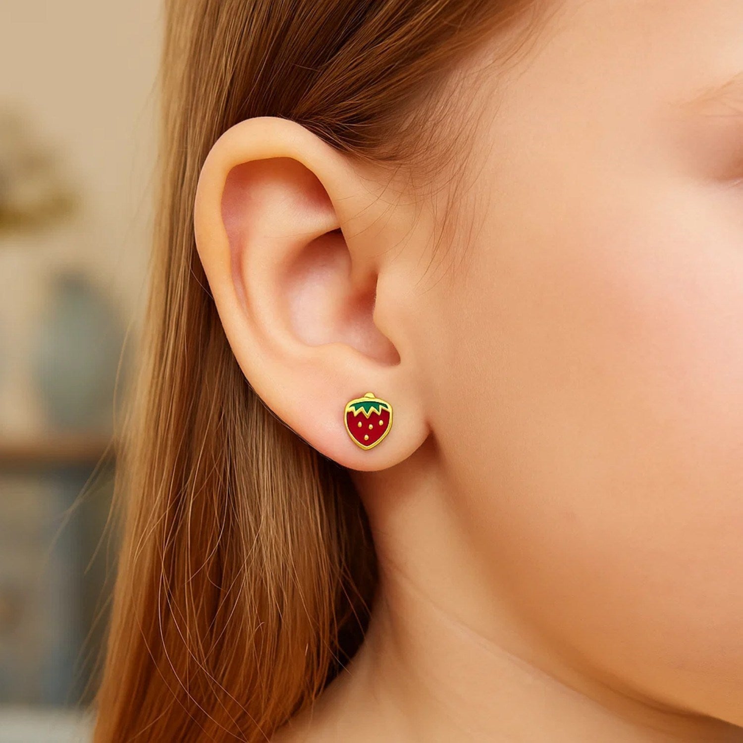 14k yellow gold enameled strawberry children's earrings with screw backs.