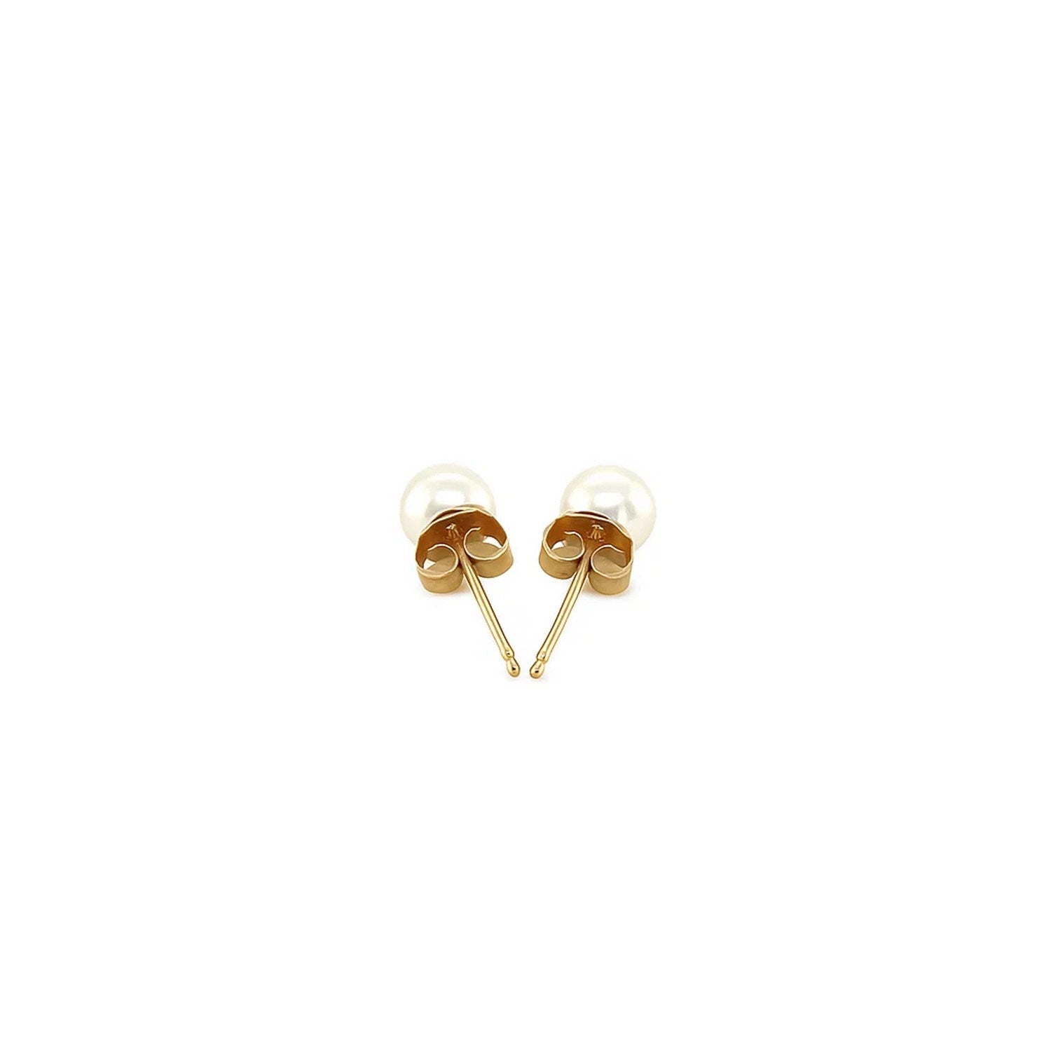 A pair of 14k yellow gold freshwater cultured white pearl stud earrings with push backs.