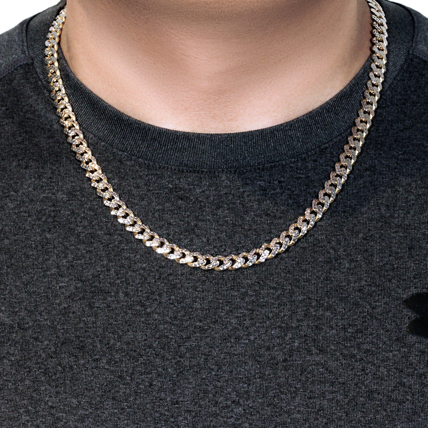 A two-tone 14k yellow gold Miami Cuban chain with white pave, 8mm wide.