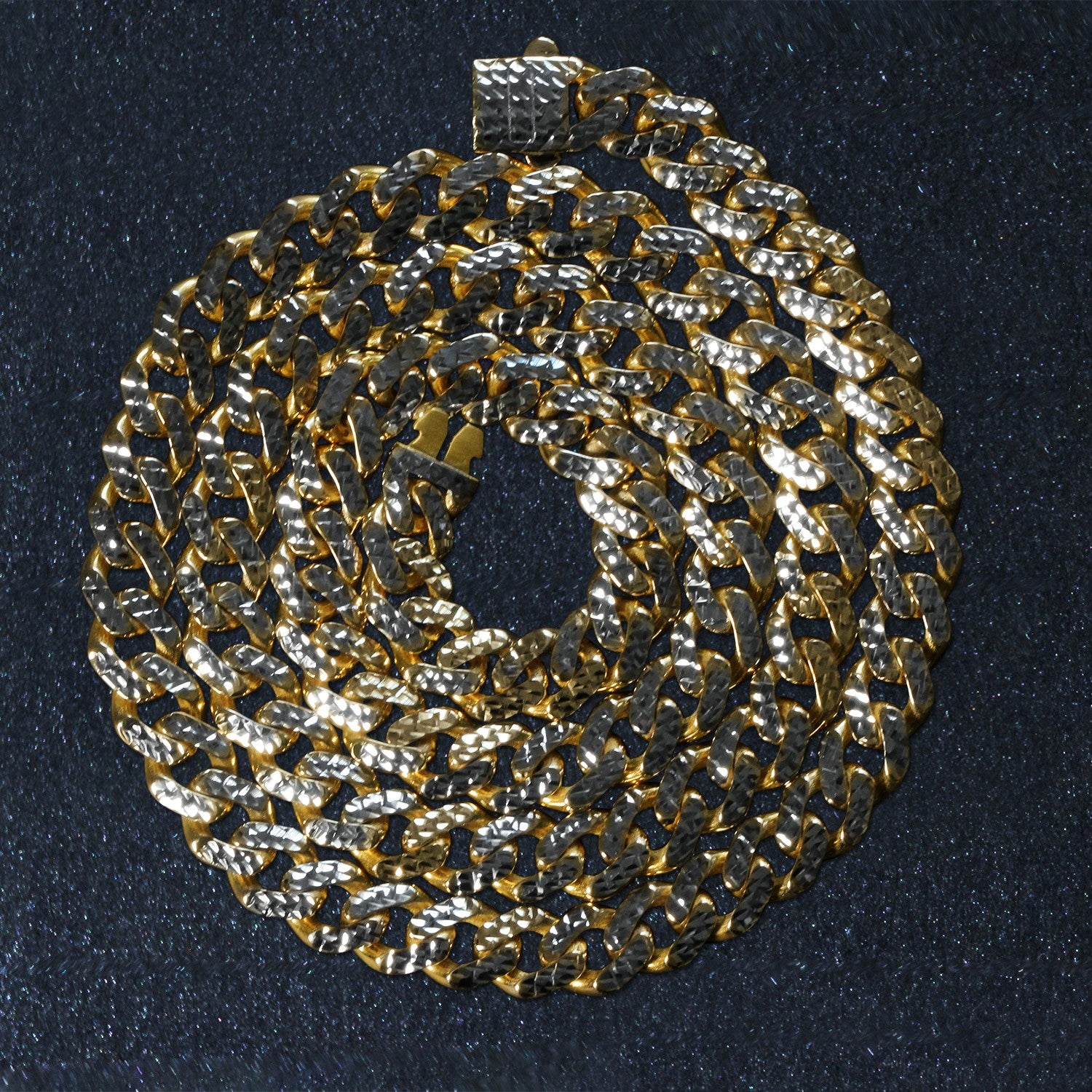 14k yellow gold and white pave Miami Cuban chain with a high polish finish.