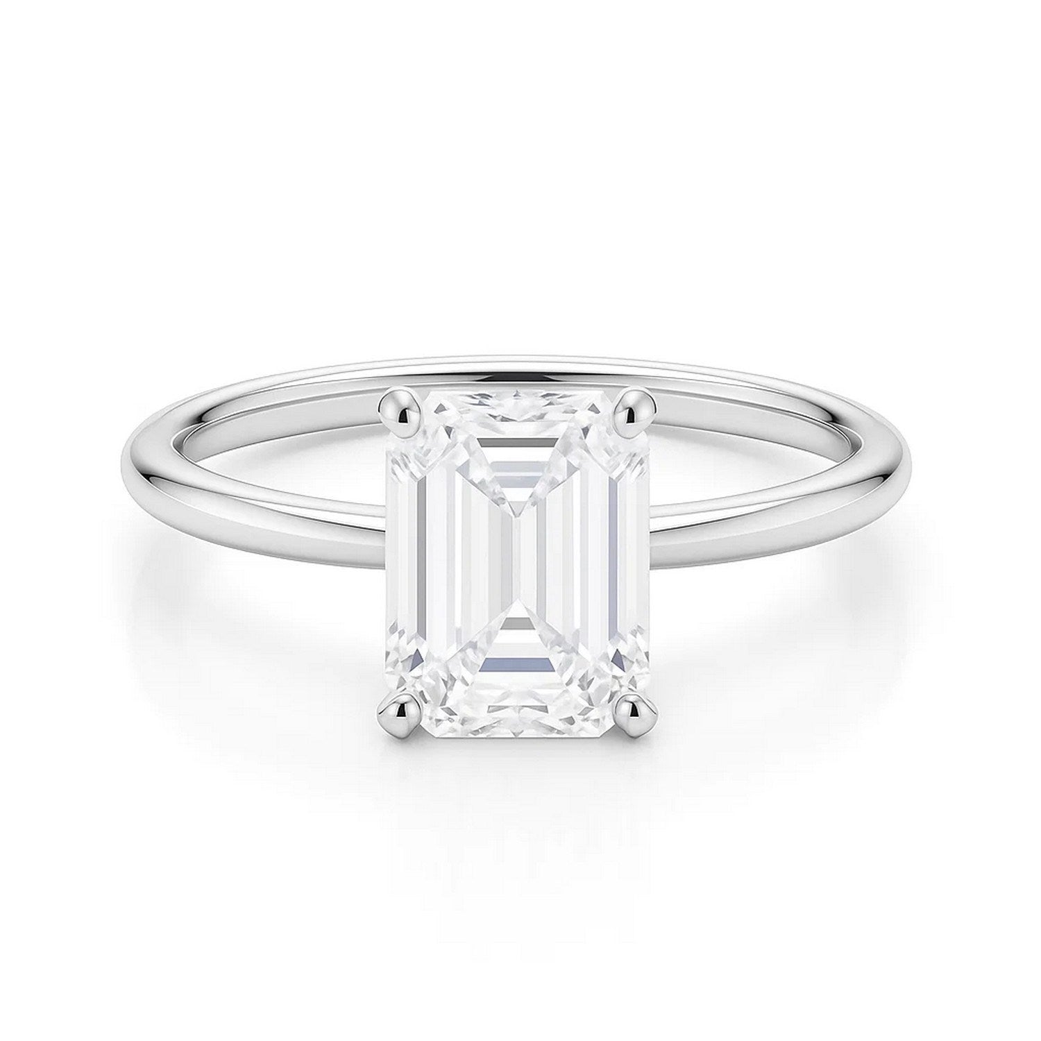 A 10K white gold solitaire ring with an emerald-cut lab-grown diamond.