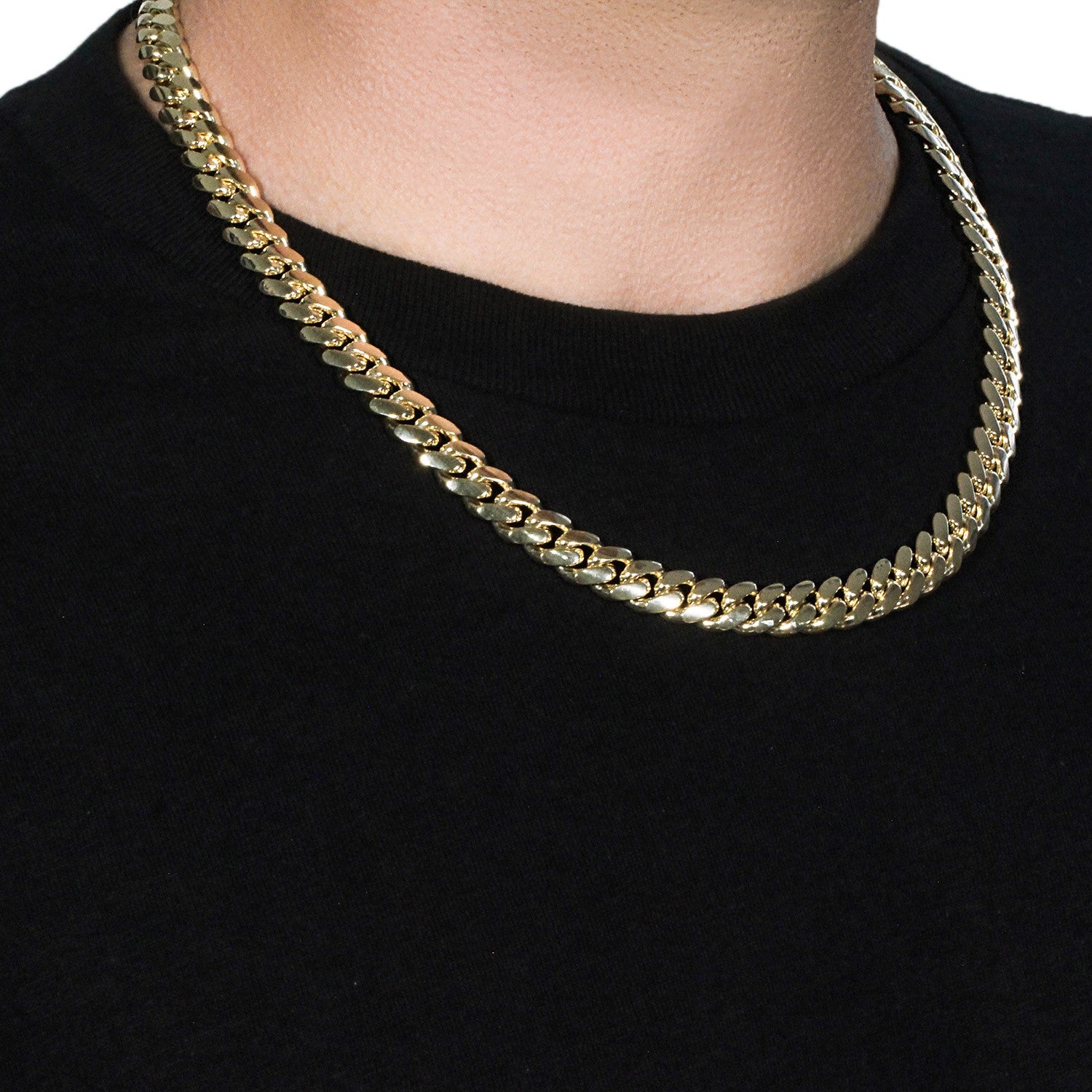 14k yellow gold classic Miami Cuban solid chain, 10.10 mm wide, on a person.