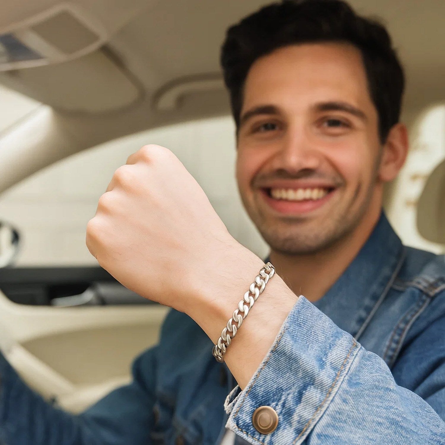 14k white gold Miami Cuban semi-solid bracelet on a man's wrist.