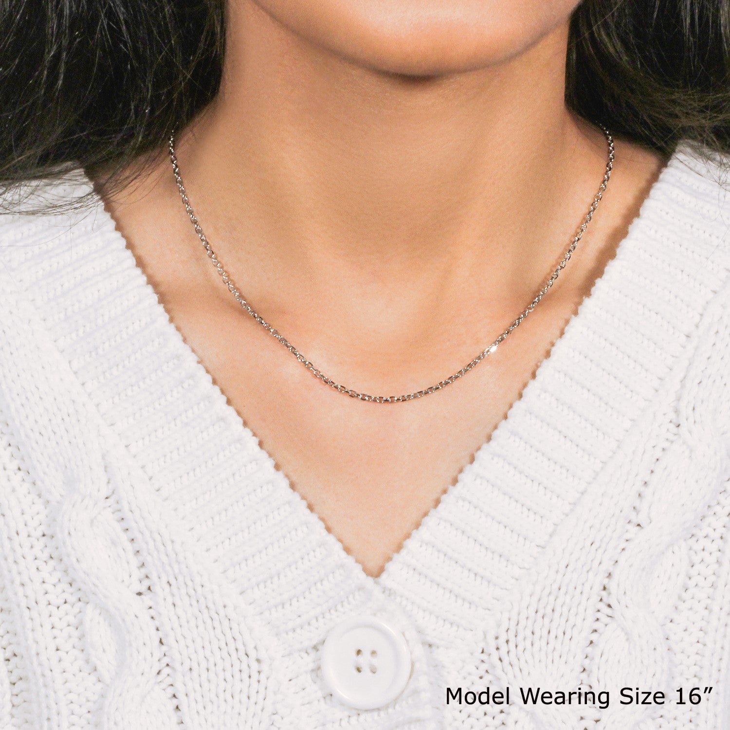 18k white gold diamond cut cable link chain, 1.90 mm wide, worn by a model.