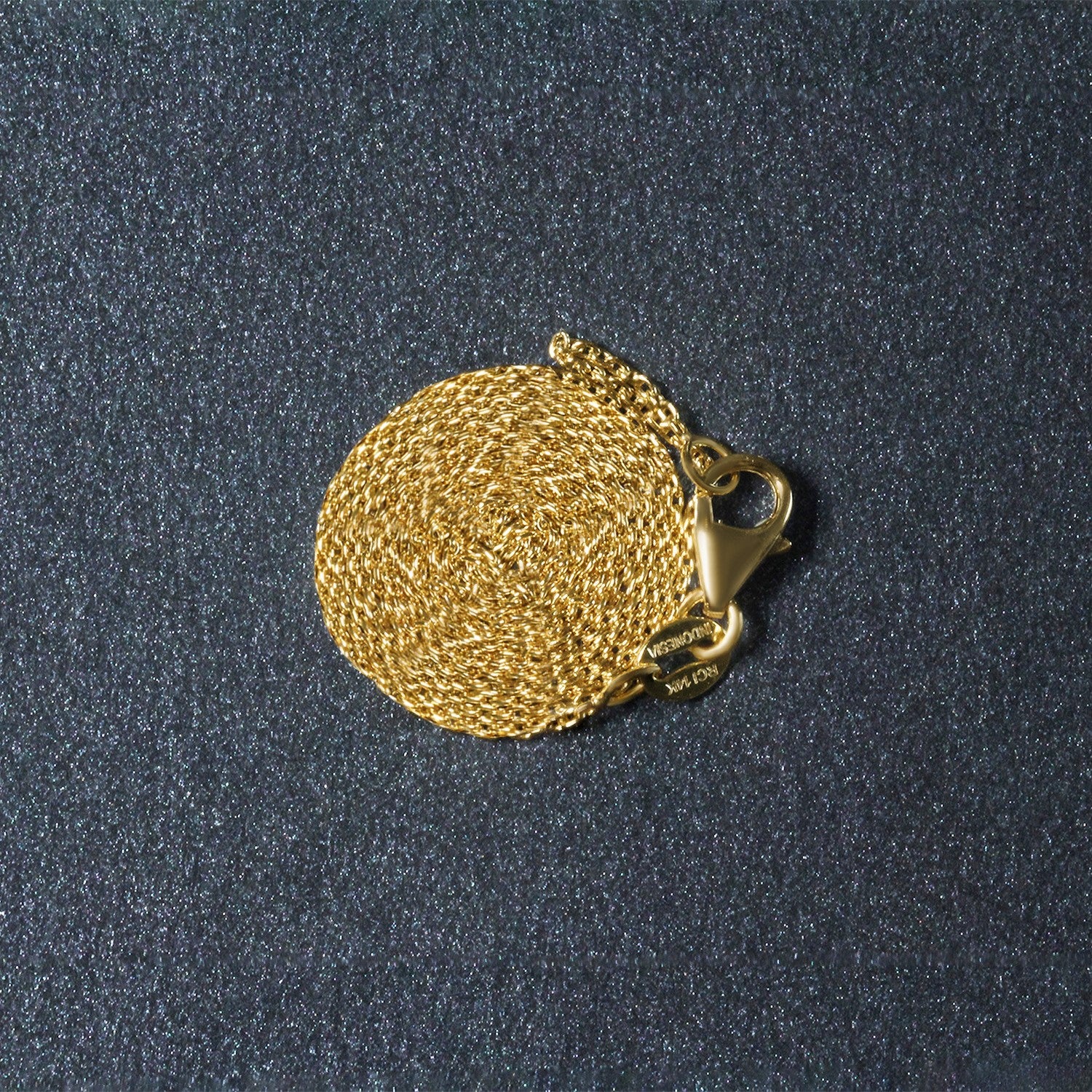 18k yellow gold round cable link chain with a lobster clasp.