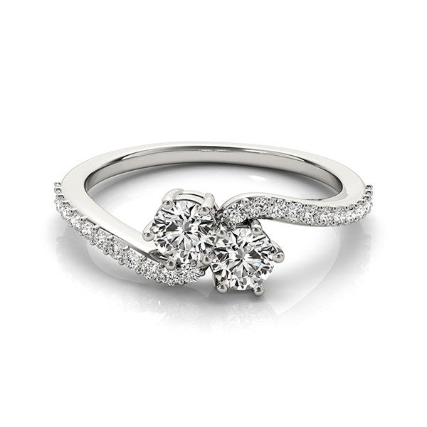 A two-stone diamond ring in 14k white gold with a curved, diamond-accented band.