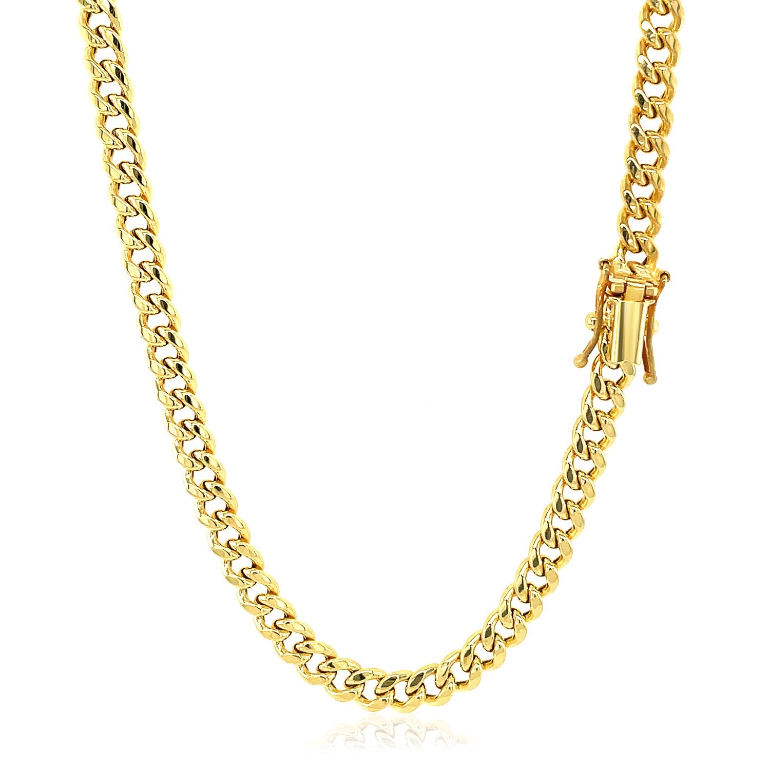 A 14k yellow gold semi-solid Miami Cuban chain with a box clasp.