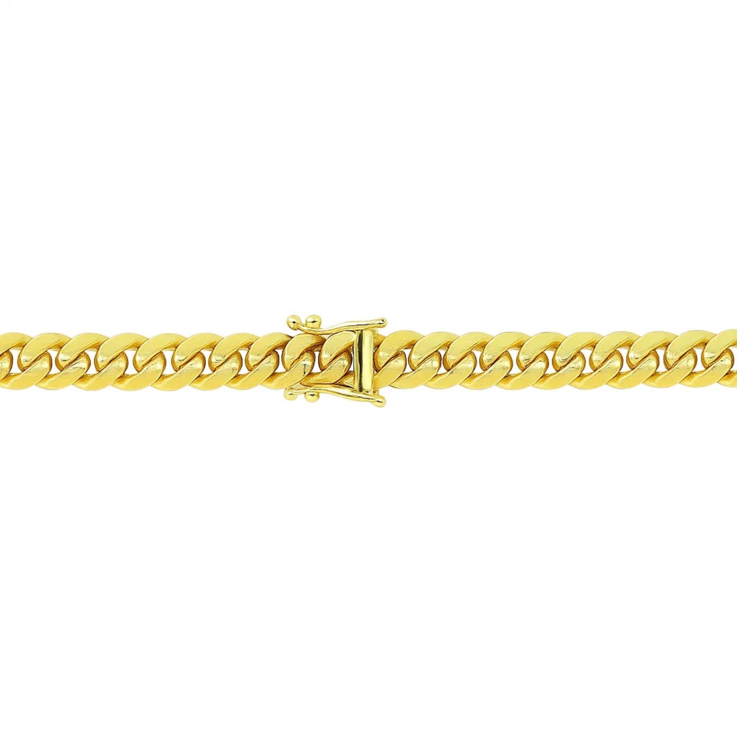 A 14k yellow gold classic Miami Cuban solid bracelet with a box clasp.