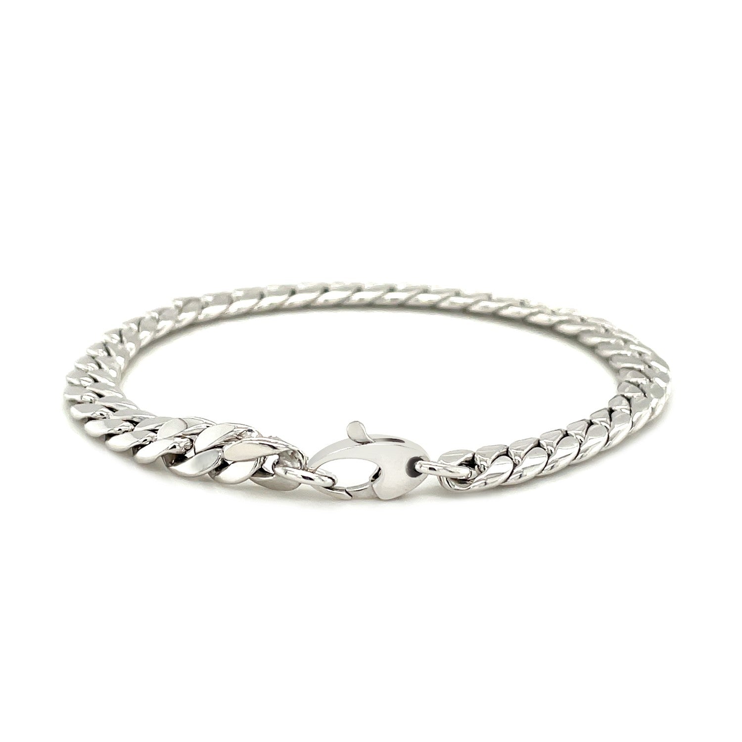 14K white gold Cuban link bracelet with a lobster clasp.